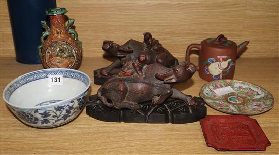 A carved buffalo vase, teapot etc.